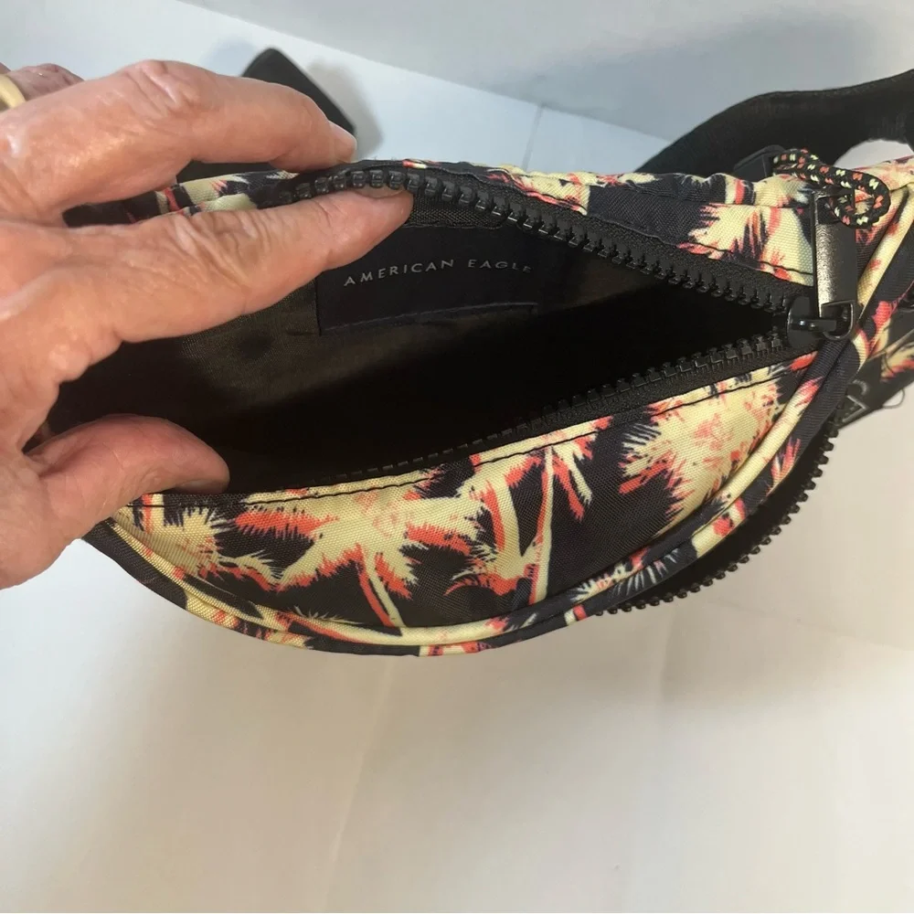American Eagle fanny pack Three zipper pockets, palm tree design
